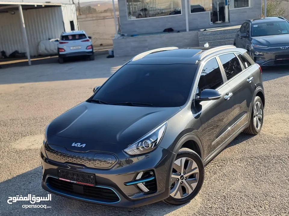 كيا نيرو 2022 فل مع فتحة بحالة الوكالة 7جيد