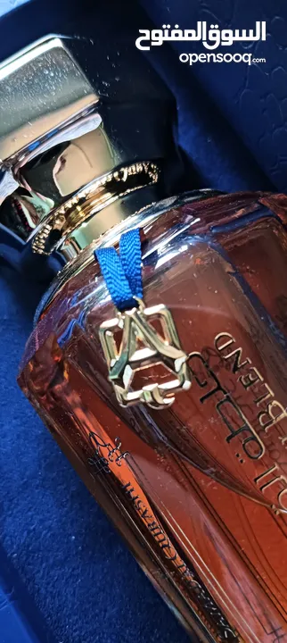 عطر خلطه القرشي جديد90مل للرجال والنساء  مع ستاند خشب لون ازرق