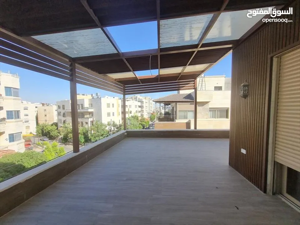 شقة فاخرة للبيع في عمان - ام السماق - طابق ثالث مع روف