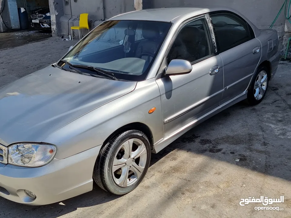 كيا سبيكترا 2001 بسعر 2400 جير عادي سياره نظيفه جدا  kia spectra 2001