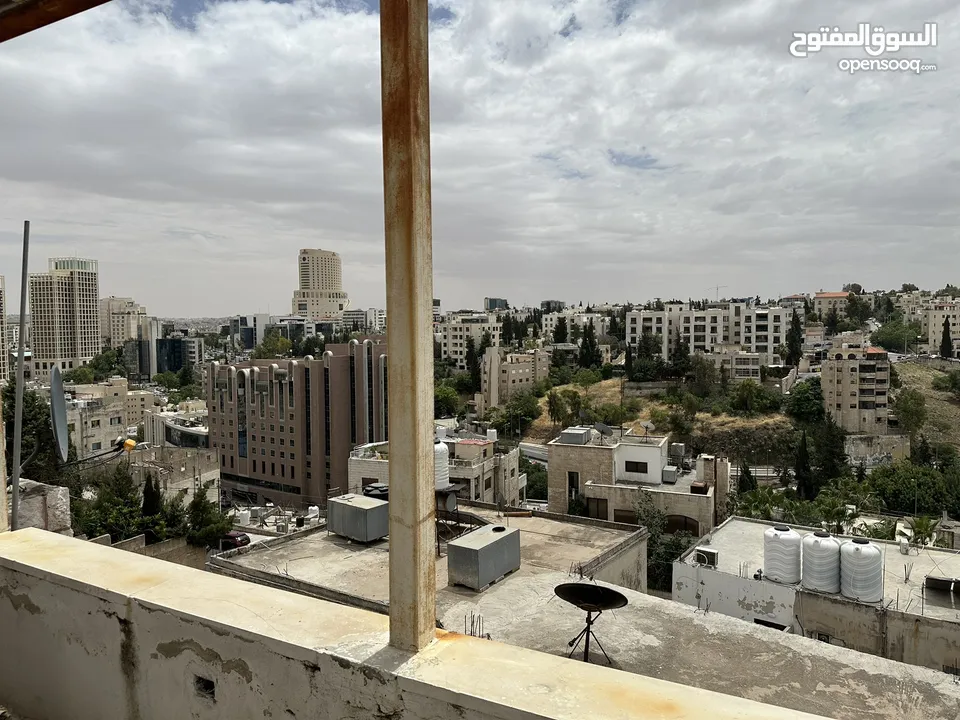 عمارة 8 شقق في العبدلي بجانب البوليفارد بدخل ممتاز للبيع بسعر الارض