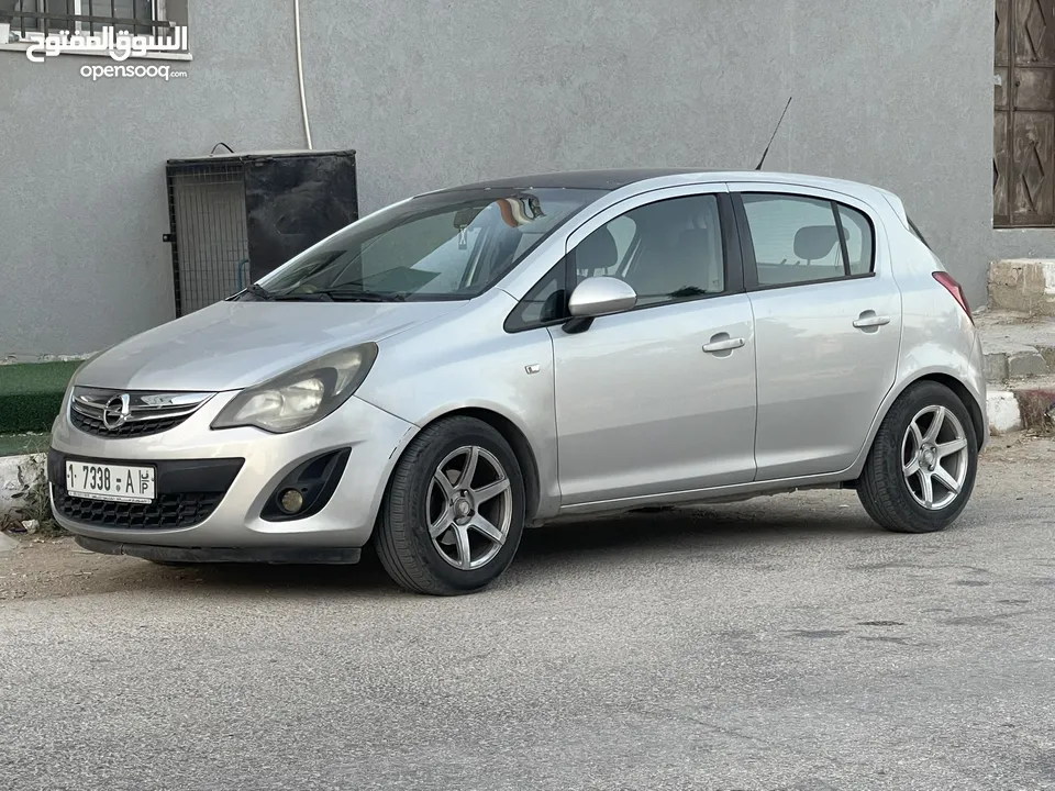 اوبل كورسا للبيع موديل 2014  جير عادي مطور 1400  سياره بالصلاه على النبي  اقتصادية جدا