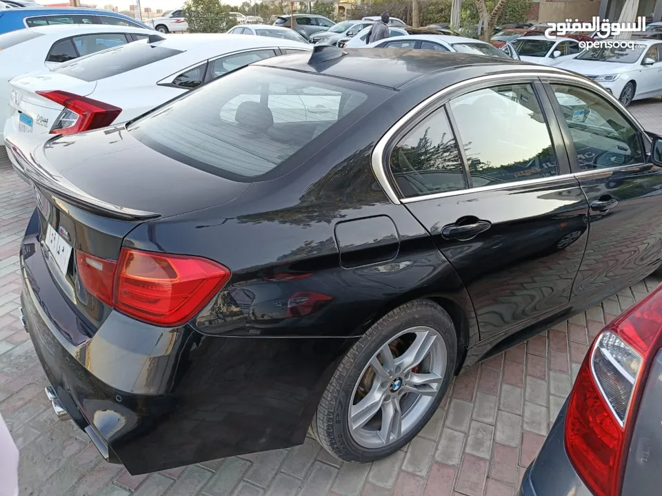 BMW F30  320 I 2013 تعديل كيت خارجي m4    سبويلر خلفي كفر مرايات بات مان  جنط 2 إنش كليبر فرامل احمر