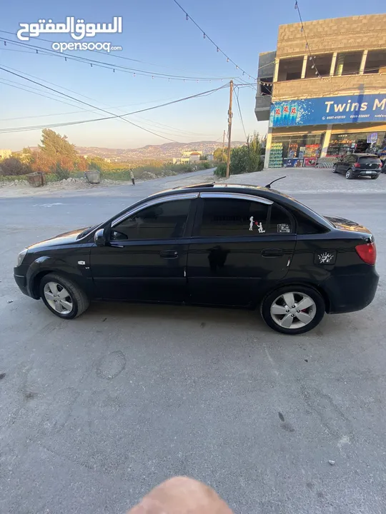 كيا برايد فتحة سقف بنزين 1600اوتماتيك