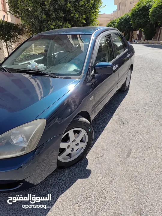 متسوبيشي لانسر GLX 2007 1600 cc وارد الخليج الكويت جميع الإضافات بإستثناء الفتحه وجنط إضافي.