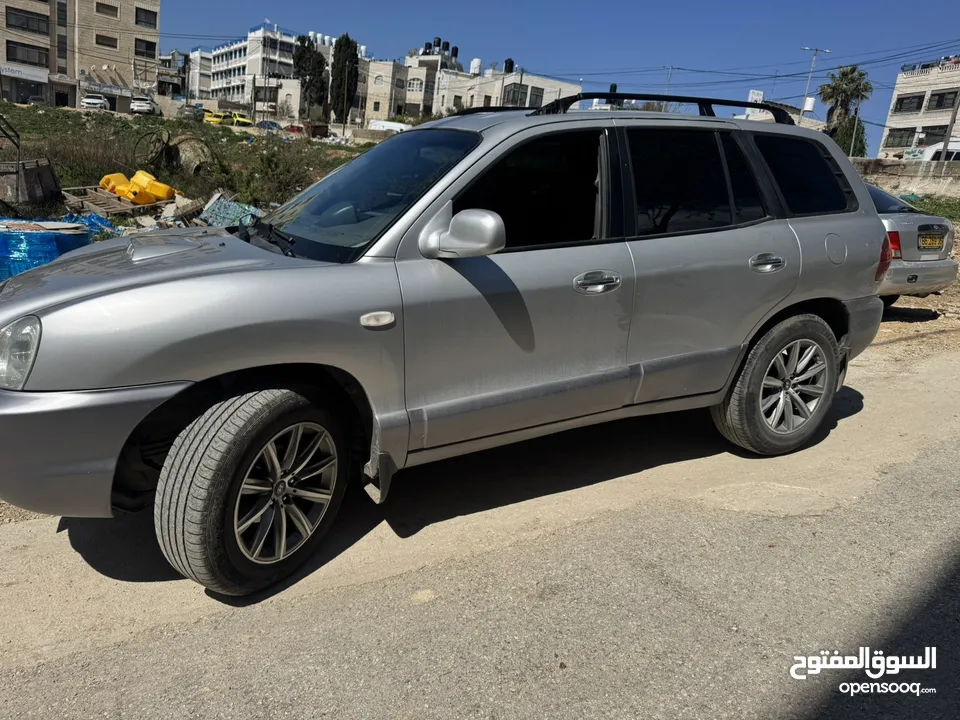 سنتافيه فل الفل بدون فتحة 2002 بدون اي مشاكل تنازل فوري اوتوماتيكي بودي 100٪؜ ديزل ماتور 2000 فل