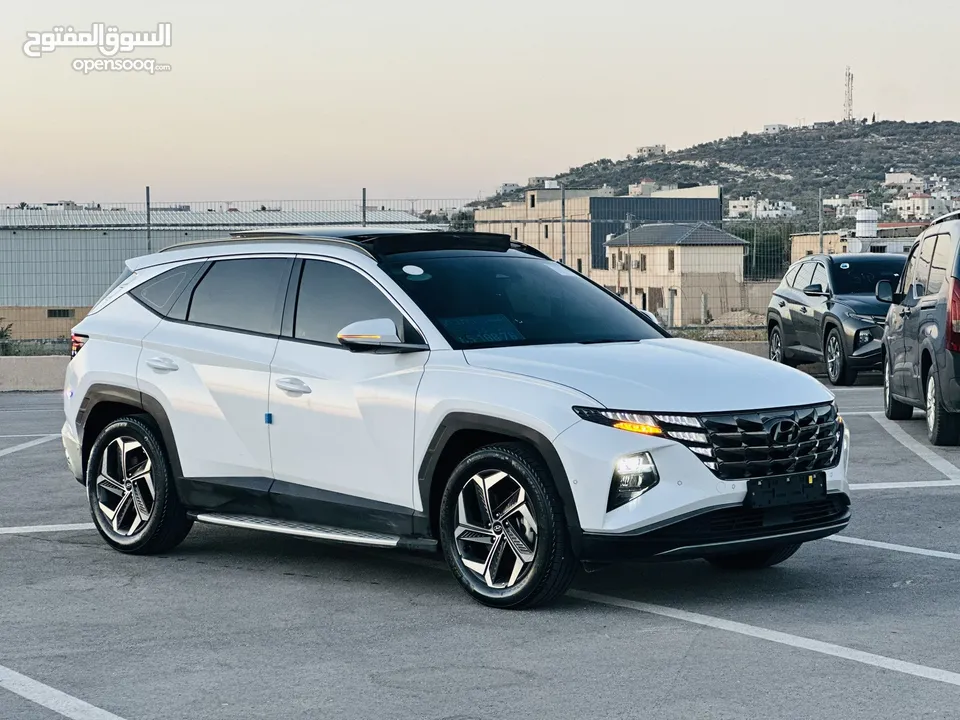 هونداي توسان/2024  فل الفل فتحة سقف بانوراما  2x4 ///240Hp بنزين + كهرباء  ( Haybrid) 1600cc