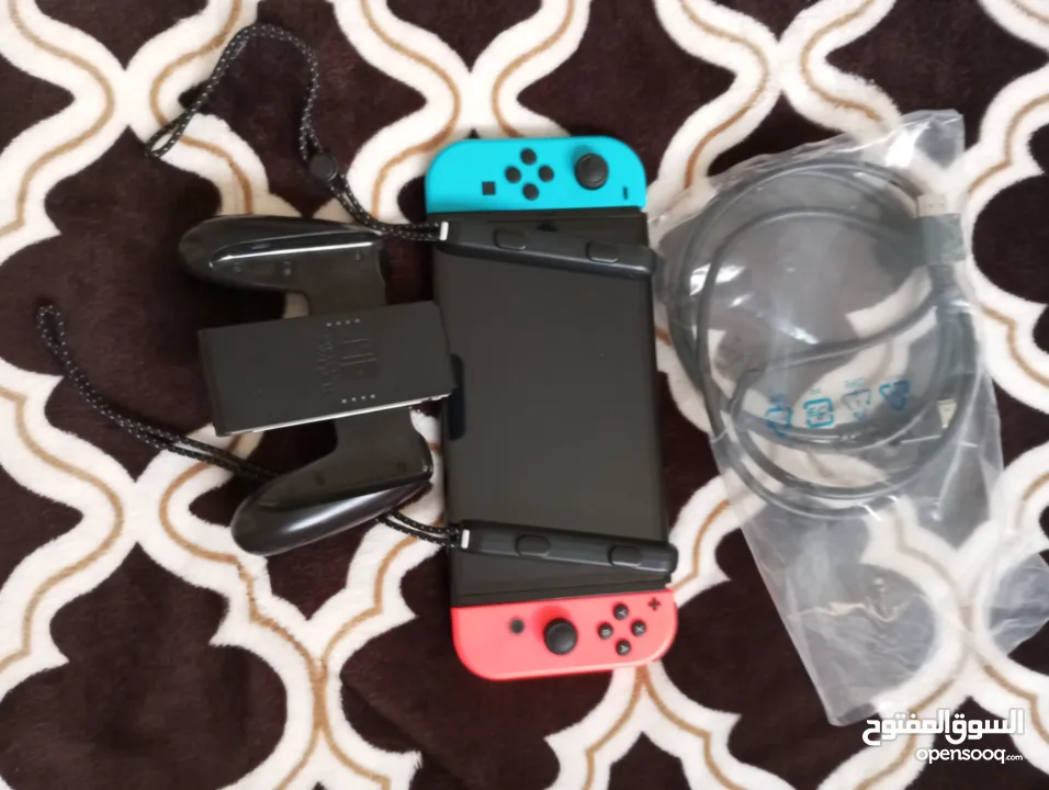 نينتندو سويتش  Nintendo Switch Oled بحالة الجديدة تحت الضمان  1100 شيكل