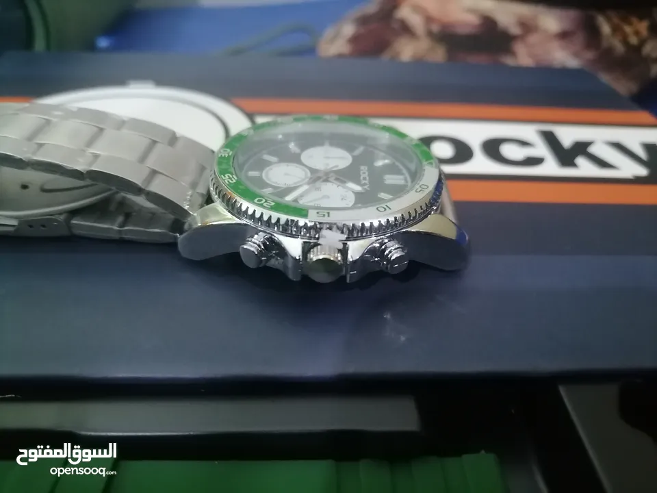 rookie green watch with five extra straps rubber  ساعة روكي سلفر و أخصر