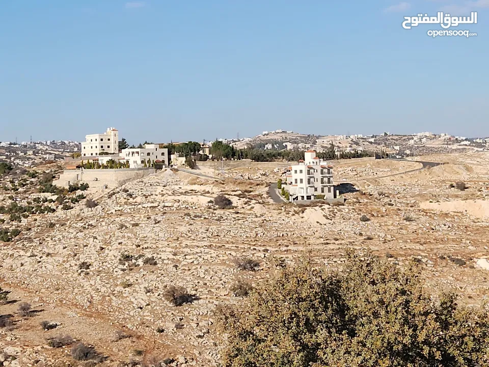 ارض للبيع 1500م في ارجمل مناطق المملكه في ابو السوس حوض الدبه حيث الاطلالات العاليه