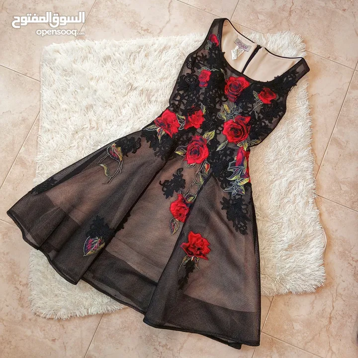 فستان جديد لم يلبس من ماركه عالميه تم شرائه من شركه الحجاوي