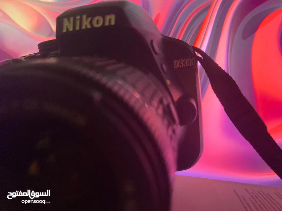 نيكون 3300d حال الوكاله  شتر قليل  عدسه 18/55 ستراب  وصلات  ترايبود  شاحن  بطاريه