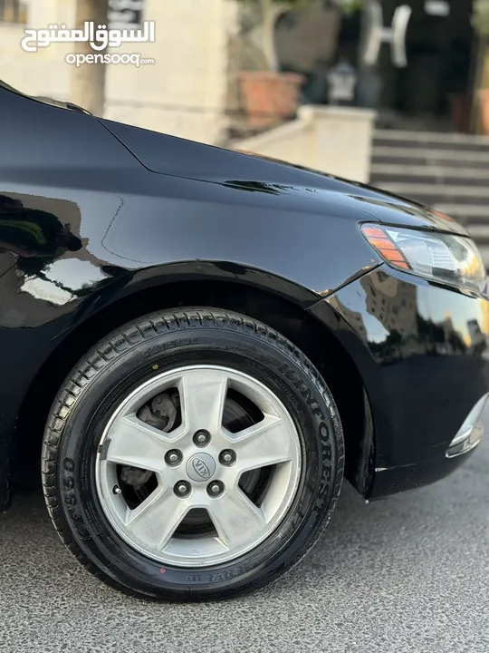 كيا فورتي للبيع بحالة ممتازه  Kia Forte 2013 لون اسود فحص كامل