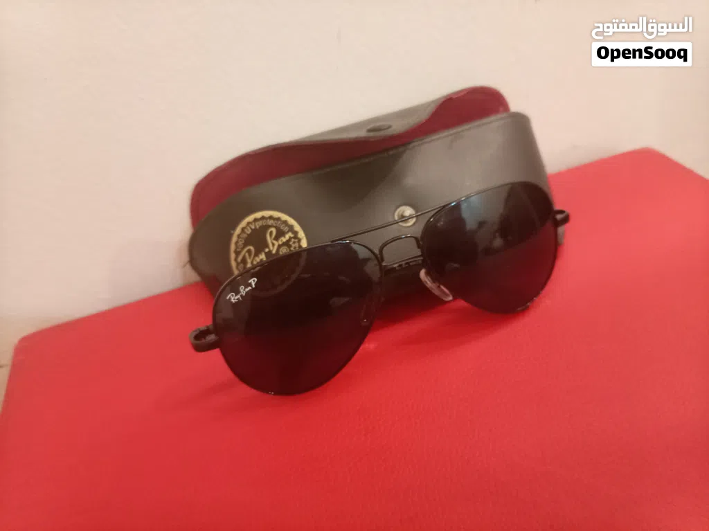 نظارات RayBan عدد 2 الذهبي والأسود. إيطالي وشرط أصلي مو درجه اوله مقاس 58