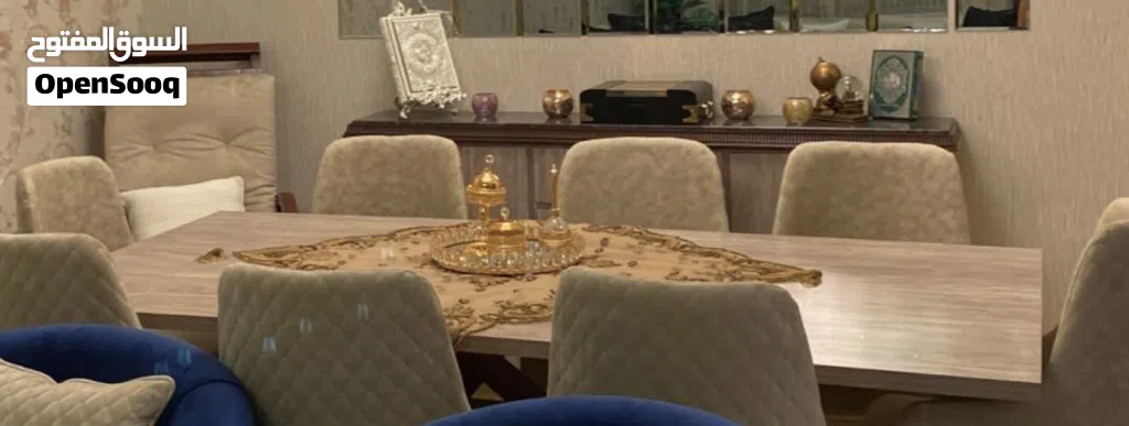 طاولة سفرة بحالة جيدة مع كرسي هزاز وخزانة دنسوار
