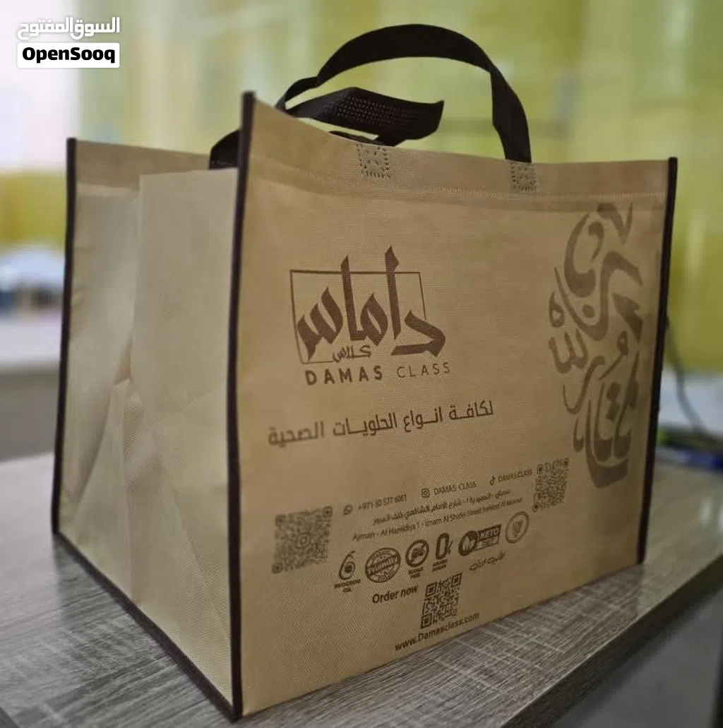 حلول تغليف أكياس قماشية فخمة بطباعة عالية الجودة t-shirt, die-cut, handled, boxes