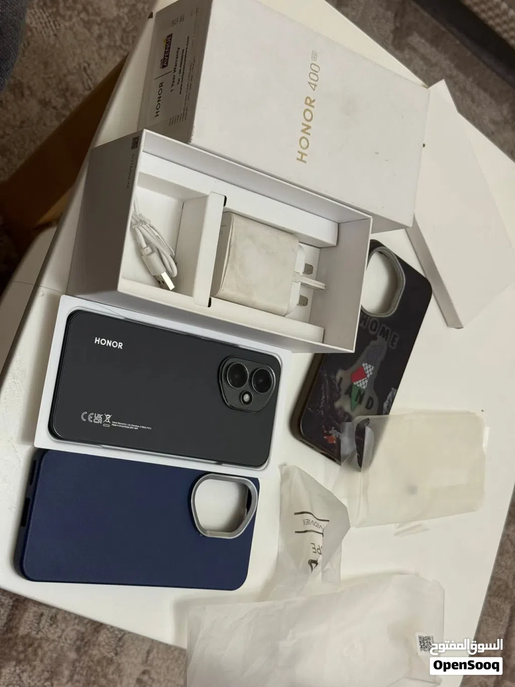 Honor 400 5g 12Ram 512g الجهاز ما فيه ولا أي غلطه مع كرتونية وعظمة الشاحن 100 w