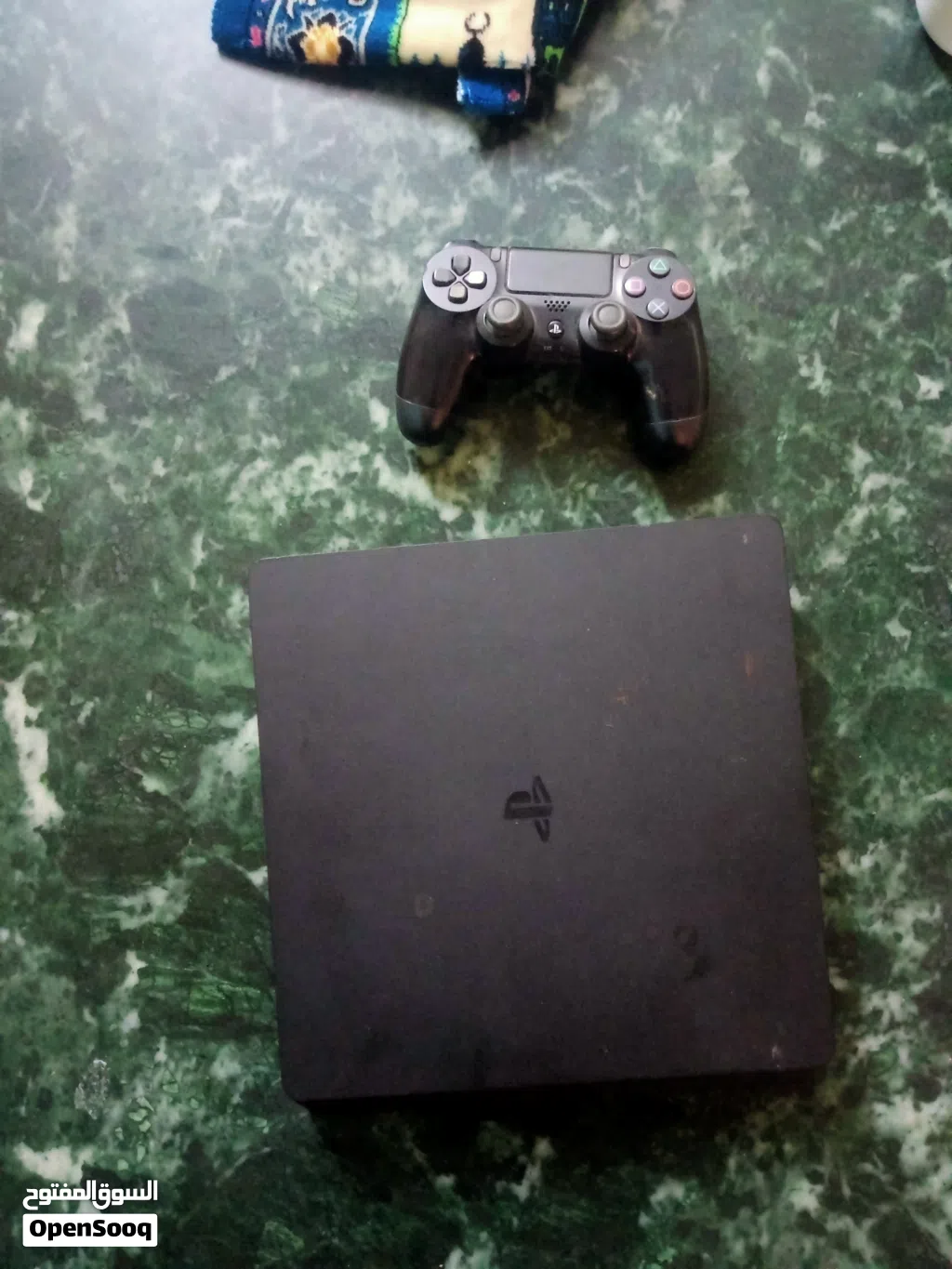 PS4 Slim 500GB بحالة ممتازة + 27 لعبة + ذراع أصلي