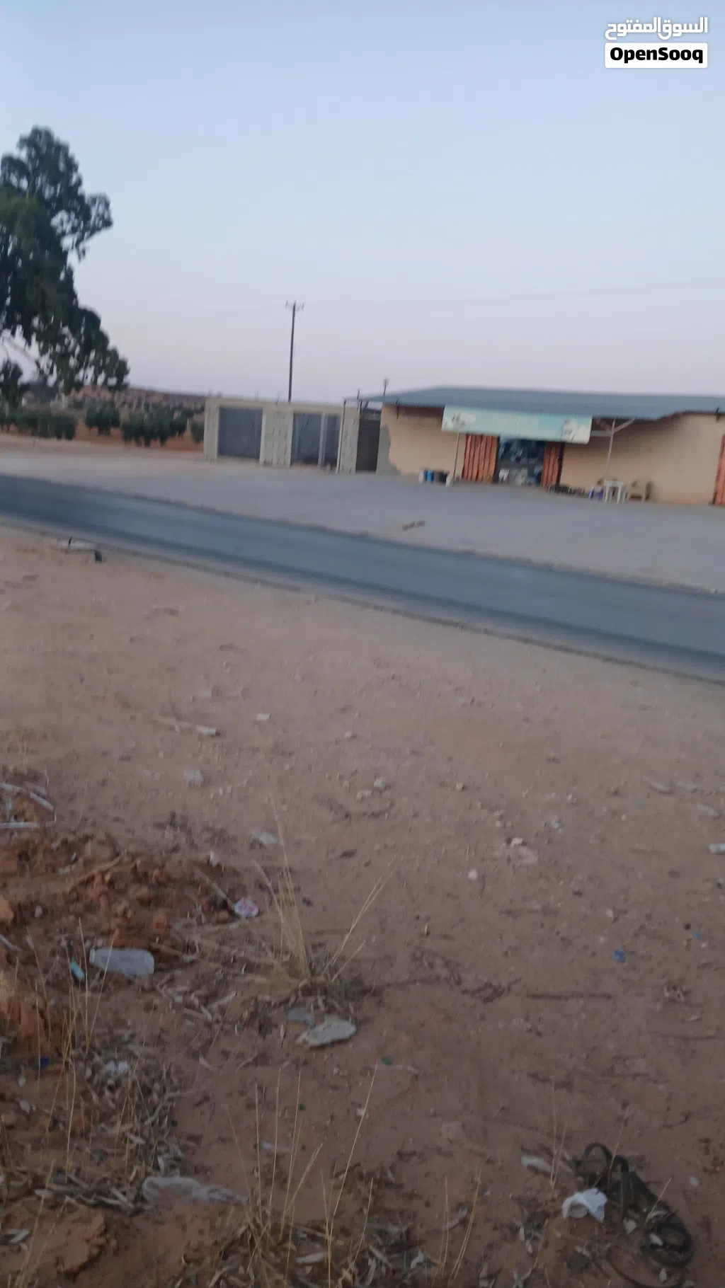 2300متر على الرئيسي ترهونةمجي للبيع أو الاستبدال