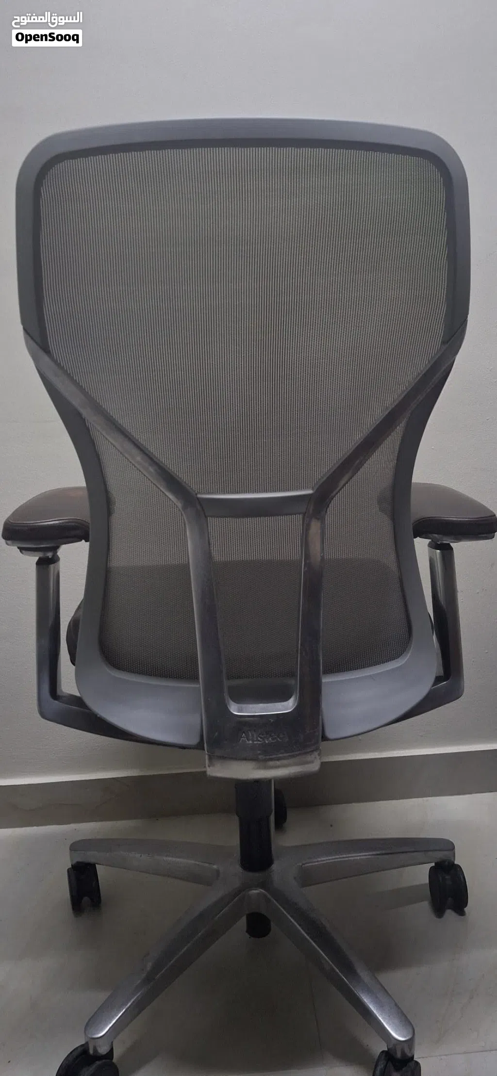 Allsteel Acuity task chair with a dark brown leather seat and mesh back