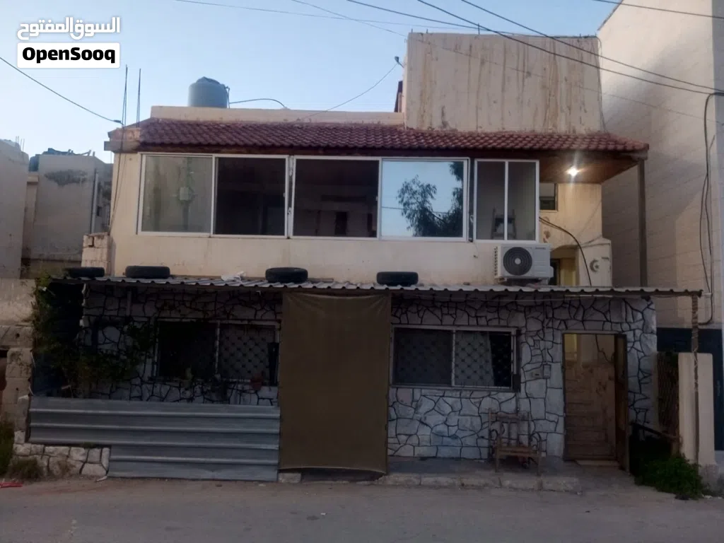 حصة في منزل في الزرقاء