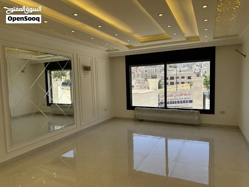 بسعر 125 الف!! شقة طابق ثاني مساحة 195 م2 /4 غرف نوم مع توفر صالة جيم(gym) خاصة بالجبيهة شارع الاردن