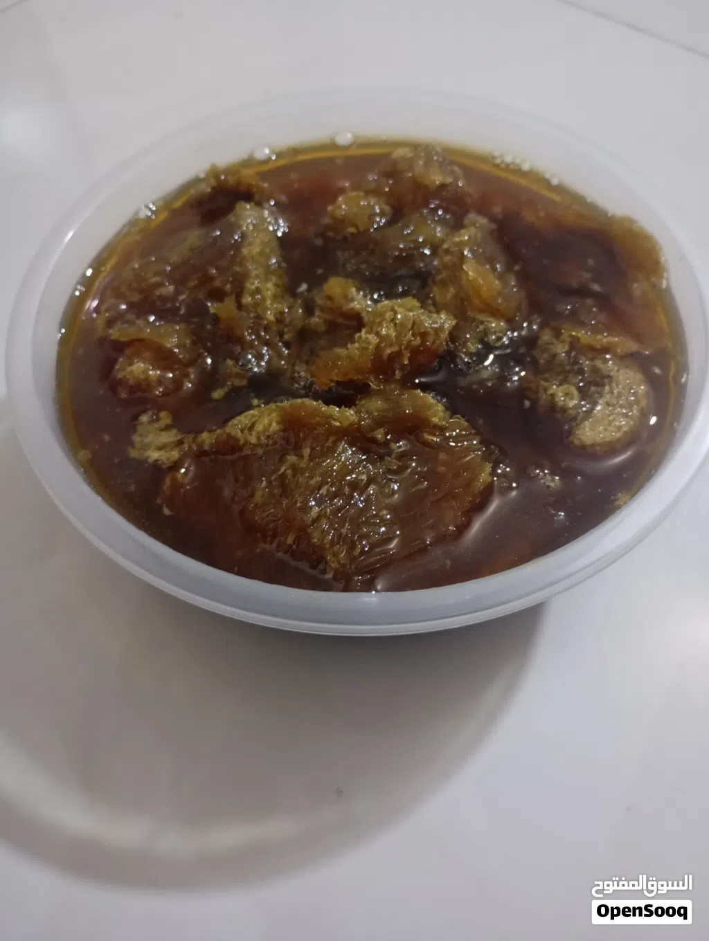 عسل سمر عماني عسل برم مضمون 100/100 وعلى مااقول الله الشاهد / الوزن كيلو الطاس او المله الصغيره