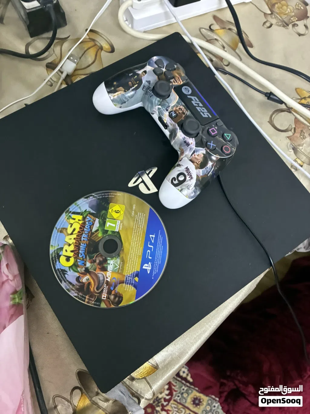 A barley used ps4 pro 1 terabyte 2 controllers and a charger