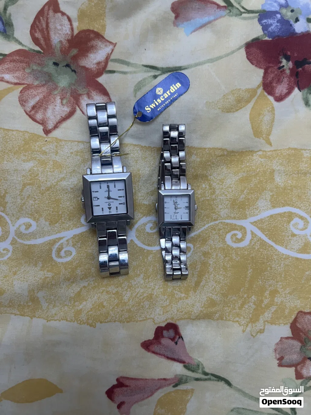 Brand new swisscardin male and female silver watch