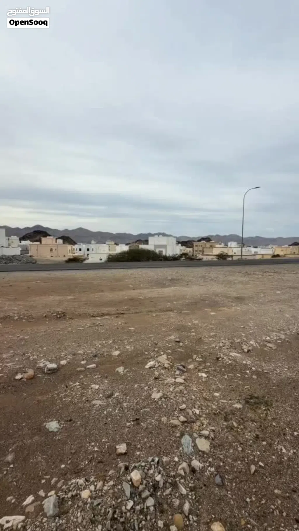 ارض عرضية سكني خط اول العامرات السادسة