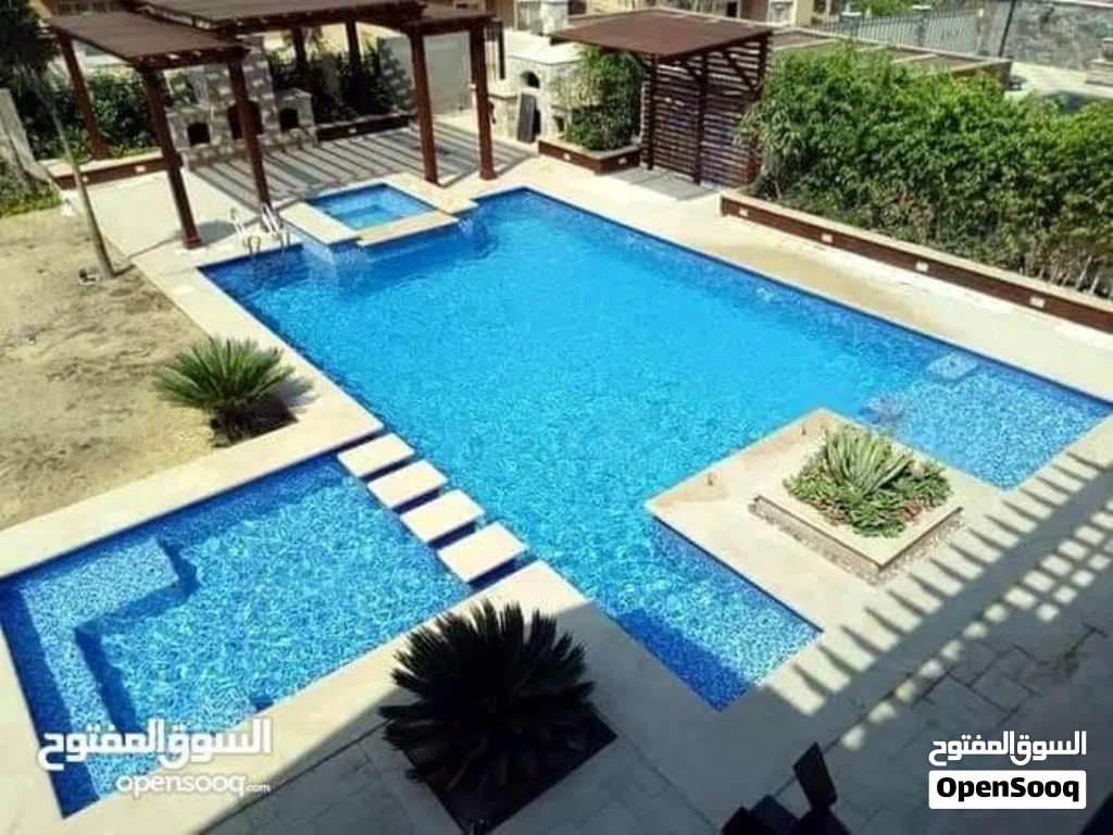 مقاولات انشاء شاليهات مسابح شلال باربكيو برك سباحه تنسيق حدائق اكواخ خشبيه مضلات استصلاح الارضي
