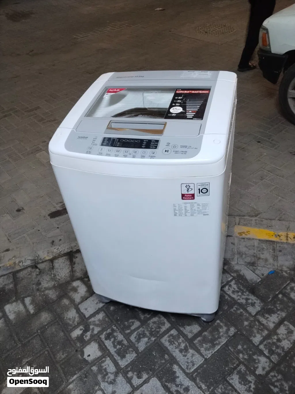 LG washing machine fully automatic 13kg good condition and working properly good with warranty with