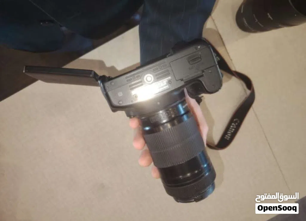 عدسة: Canon 55-250mm IS STM (بحالة ممتازة) استعمال قليل جداً مع اغطيتها للبيع او للبدل بـ: Canon 24m