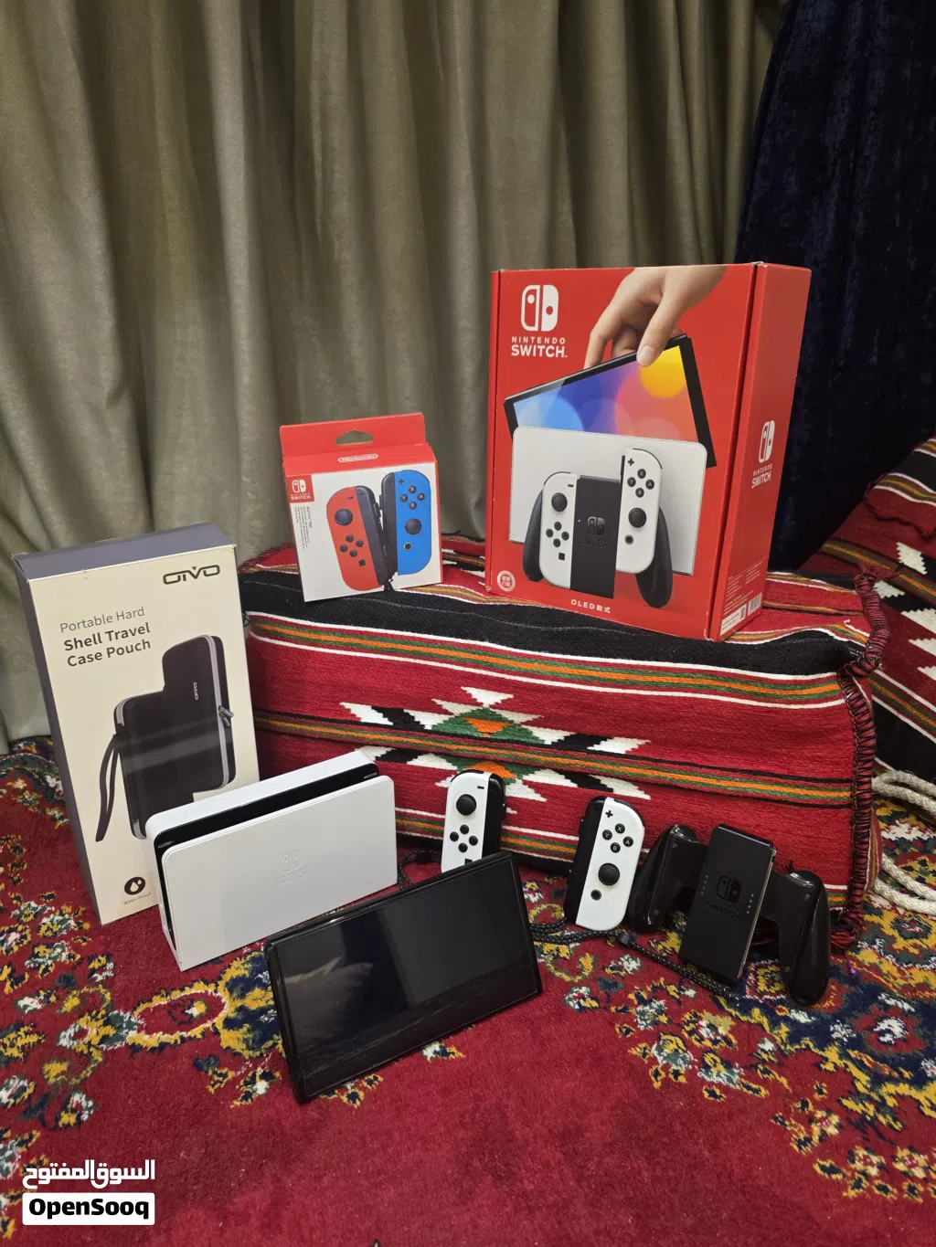 Nintendo Switch OLED نينتندو سويتش اوليد أبيض مع 4 ألعاب أصلية + يدات إضافية + حقيبة + الكرتون