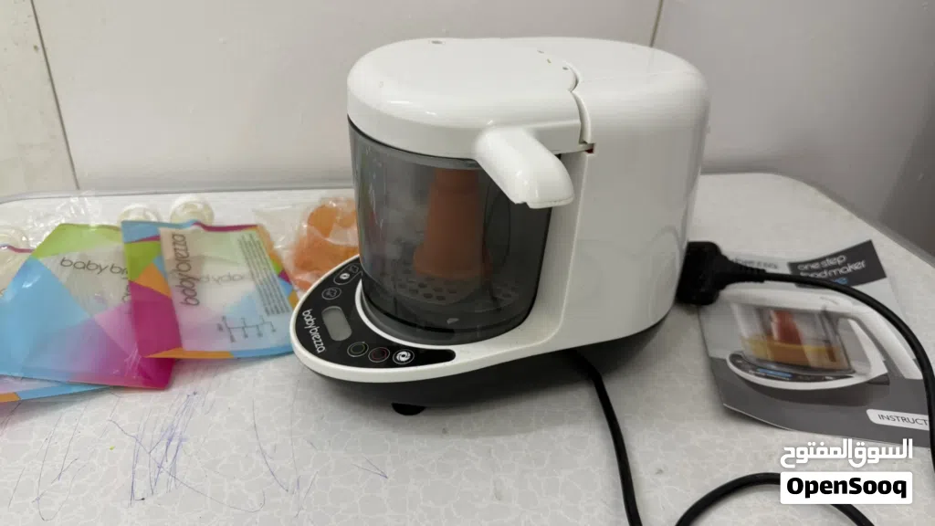 صانعة طعام الأطفال Baby Brezza Deluxe - مستخدم شهر واحد بحالة الوكالة