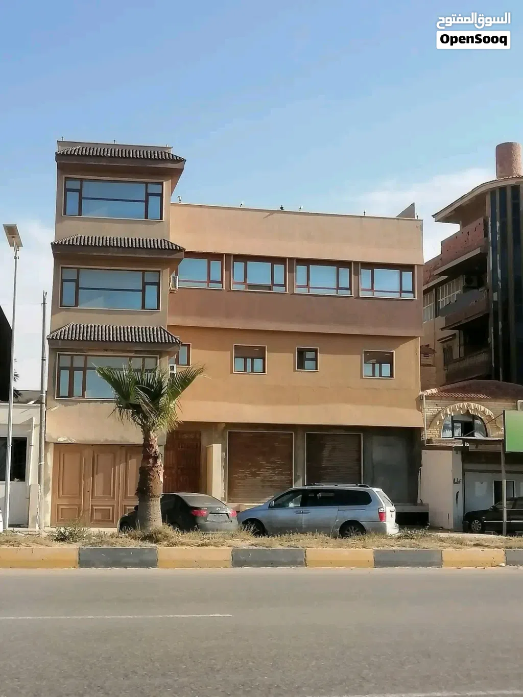 مبنى تجاري ع الرئيسي ف تاجوراء طريق الشط بالقرب من منارة تاجوراء ومصحة الاخوه