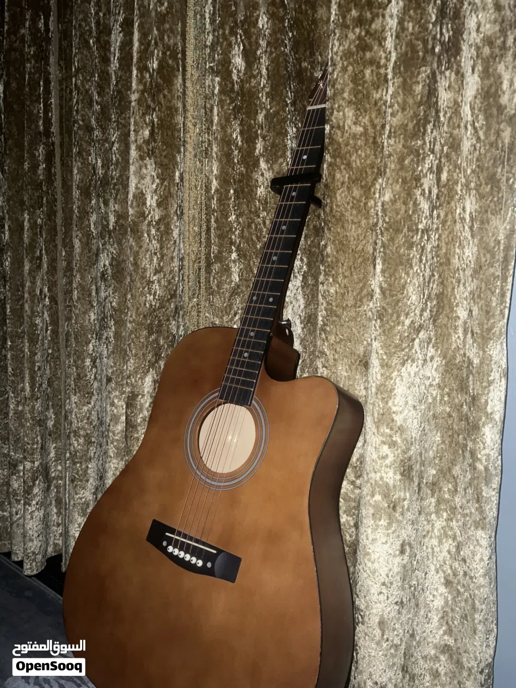 Beginner Acoustic Guitar With brand new strings capo, a little damaged bag, plectrums, and more