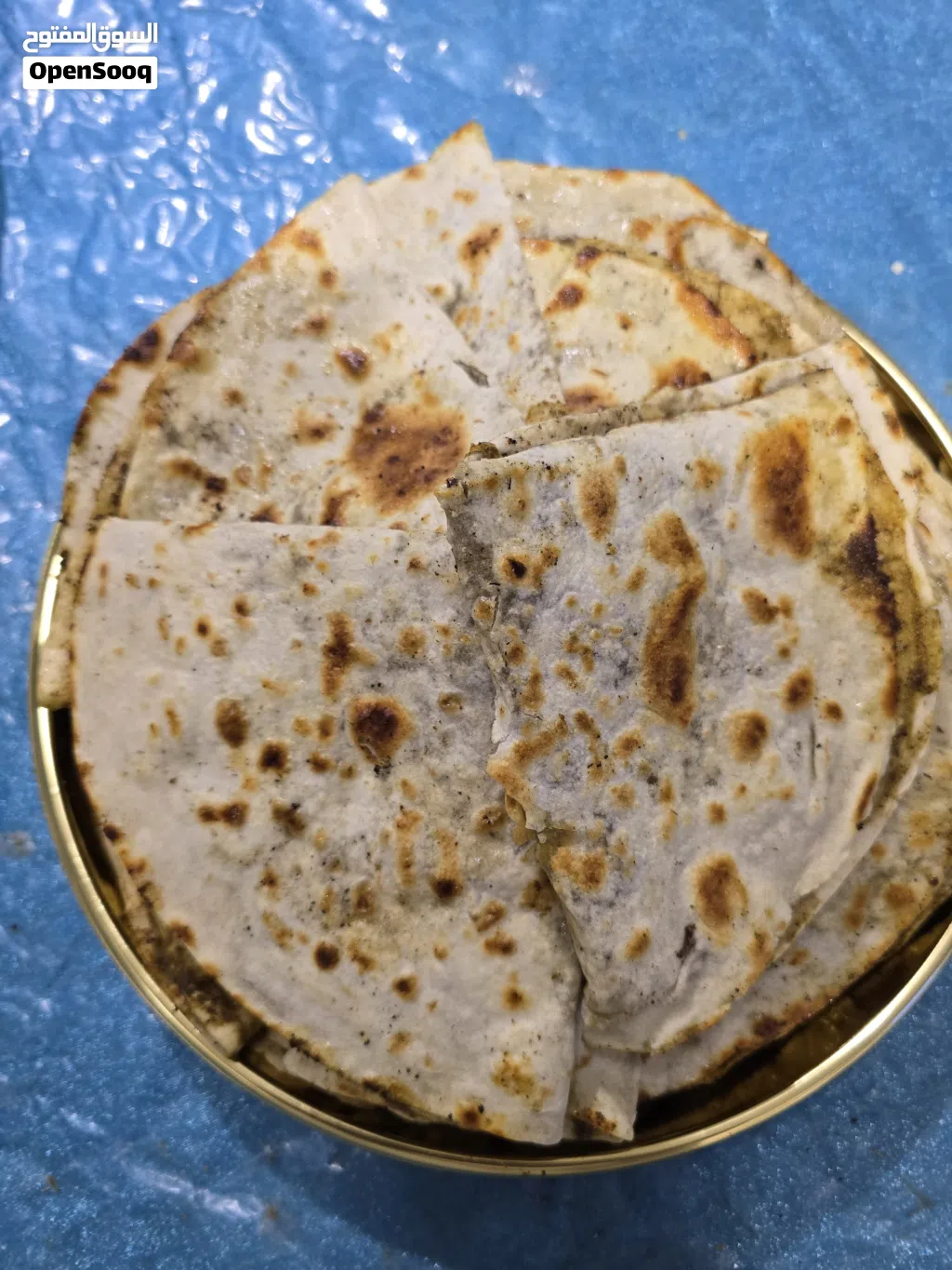 خبز صاج مهياوة بالزبدة او زيت زيتون او دهن عداني مهياوة اجار ثوم يبل مع طماط او بدون طماط كيلو 25حبة