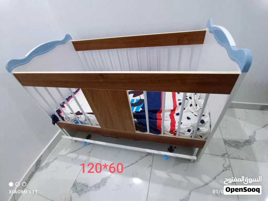 سرير اطفال بالفراش