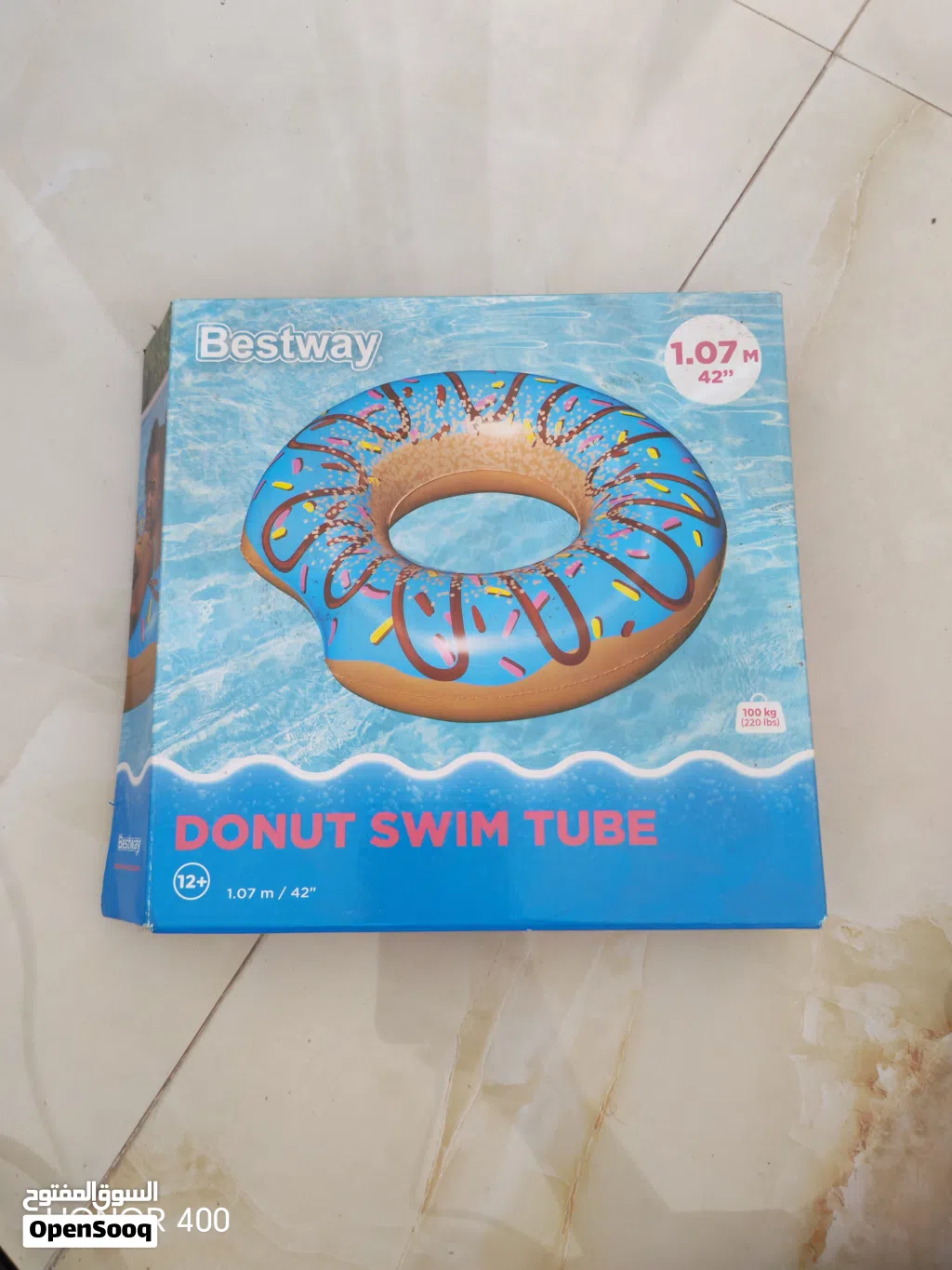 Inflatable donut pool floating tube