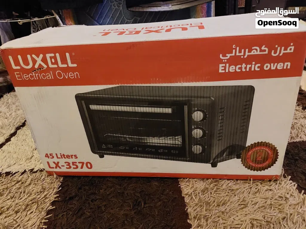 فرن كهرباء جديد بكرتونة مامستعمل نهائي لون ابيض نوع لوكسيل 45 لتر مع صواني عدد (2)