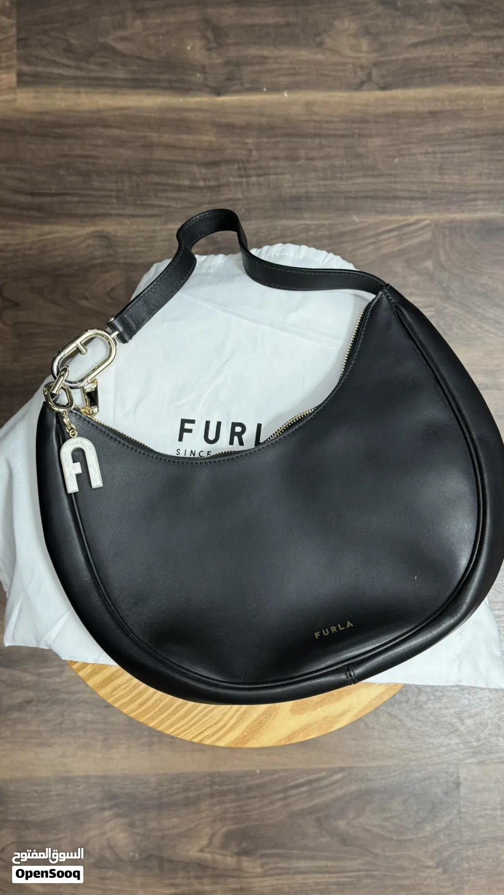 new furla crescent bag with charm