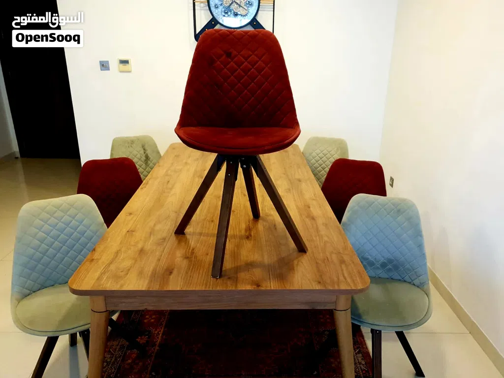 A unique 8-seater dining table with 360-degree swivel chairs