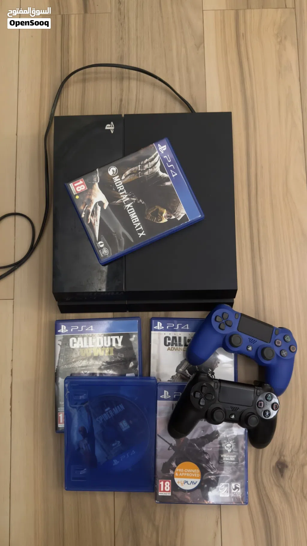 PlayStation 4 with 2 controllers and games