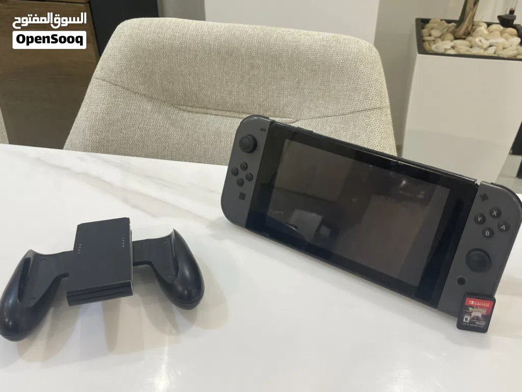 NINTENDO SWITCH BLACK with Pokémon shining pearl and accessories