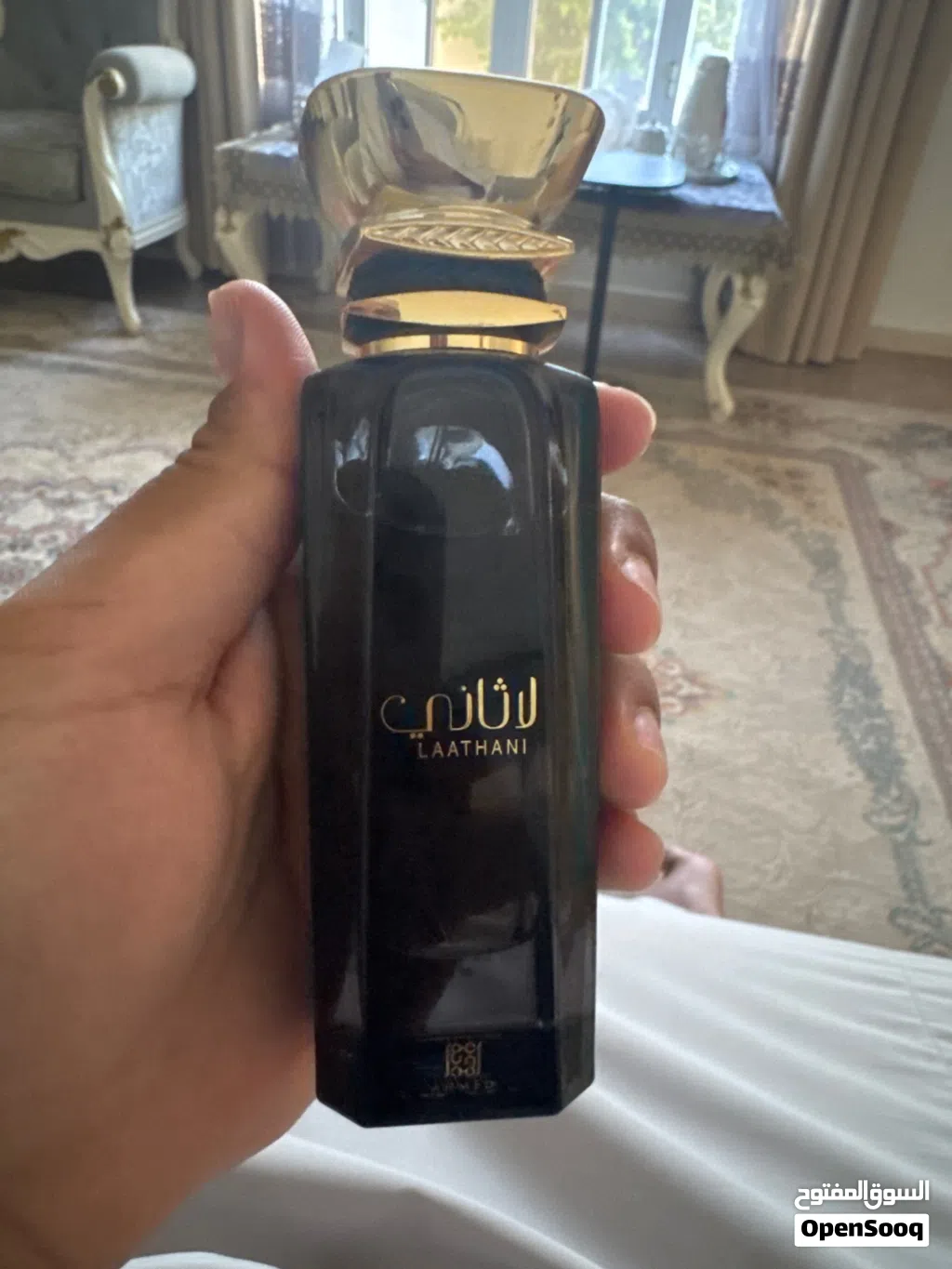 عطر لاثاني من احمد المغربي مستعمل قليل جدا
