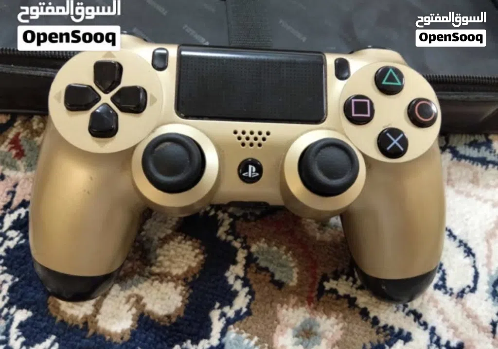 جير PS4 ذهبي أصلي + شريطين من أقوى الألعاب (بحالة ممتازة)