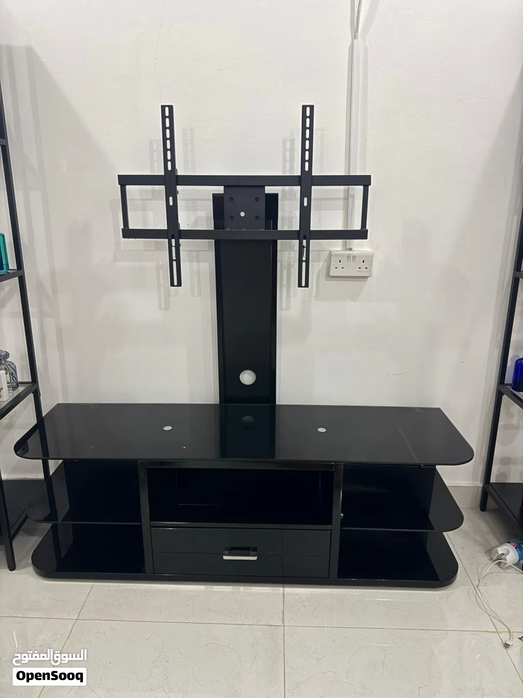 Tv stand must pick up
