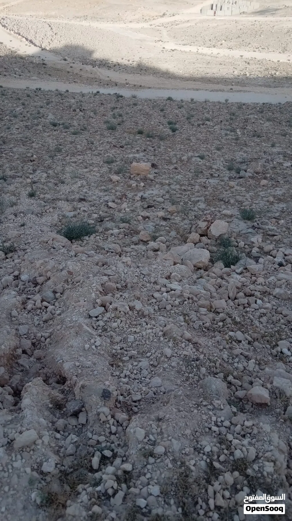 ارض في طريق شارع الميه