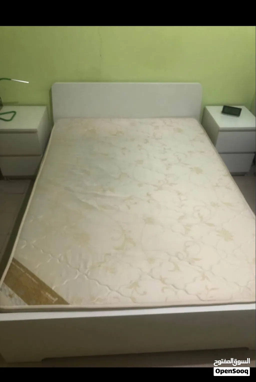 Bed with medical mattress and 2 night stands